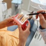 Ce factori influențează prețul unui implant dentar: La ce să fii atent?